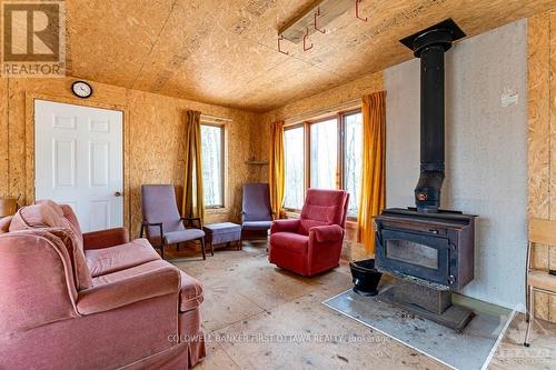 1044 Lavant Mill Road, Lanark, ON - Indoor Photo Showing Living Room With Fireplace