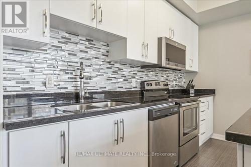 311 - 90 Charlton Avenue W, Hamilton, ON - Indoor Photo Showing Kitchen With Double Sink