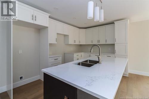 18 Elmwood Drive, Hampton, NB - Indoor Photo Showing Kitchen With Double Sink