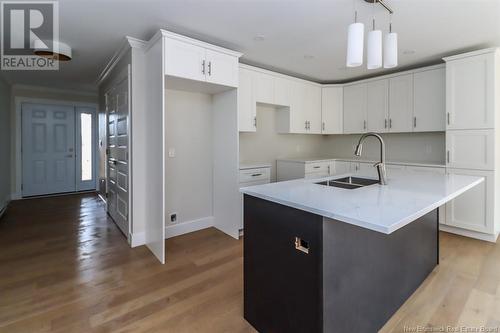 18 Elmwood Drive, Hampton, NB - Indoor Photo Showing Kitchen With Double Sink