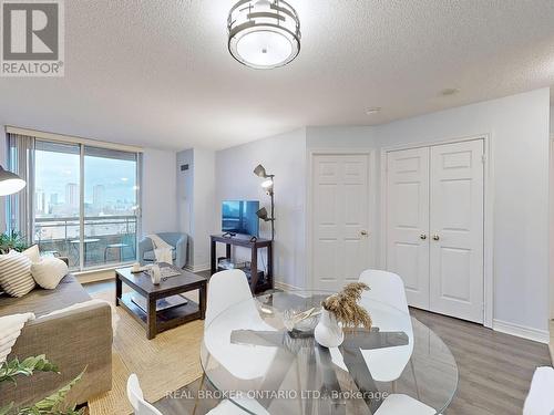 917 - 1700 Eglinton Avenue E, Toronto, ON - Indoor Photo Showing Living Room