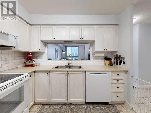 917 - 1700 Eglinton Avenue E, Toronto, ON - Indoor Photo Showing Kitchen With Double Sink