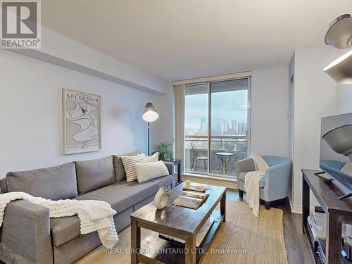 917 - 1700 Eglinton Avenue E, Toronto, ON - Indoor Photo Showing Living Room