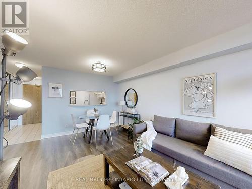 917 - 1700 Eglinton Avenue E, Toronto, ON - Indoor Photo Showing Living Room