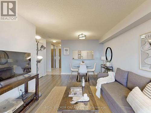 917 - 1700 Eglinton Avenue E, Toronto, ON - Indoor Photo Showing Living Room With Fireplace