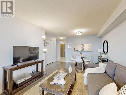 917 - 1700 Eglinton Avenue E, Toronto, ON - Indoor Photo Showing Living Room