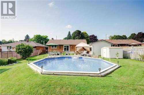 215 Brenda Crescent, Woodstock, ON - Outdoor With Above Ground Pool With Backyard