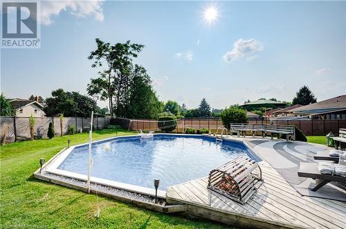 215 Brenda Crescent, Woodstock, ON - Outdoor With Above Ground Pool With Backyard