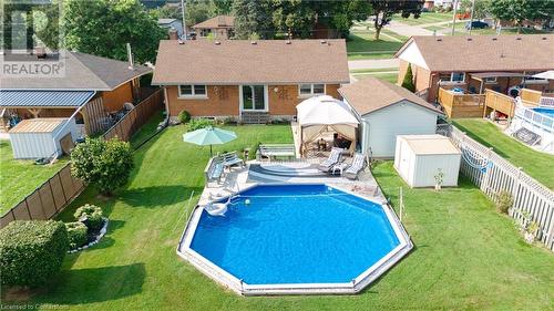 215 Brenda Crescent, Woodstock, ON - Outdoor With Above Ground Pool With Deck Patio Veranda With Backyard