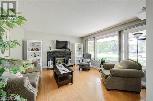 215 Brenda Crescent, Woodstock, ON - Indoor Photo Showing Living Room With Fireplace