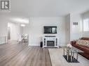 101B - 9090 Yonge Street, Richmond Hill, ON  - Indoor Photo Showing Living Room With Fireplace 