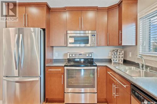 103 410 Main Street, Saskatoon, SK - Indoor Photo Showing Kitchen With Double Sink