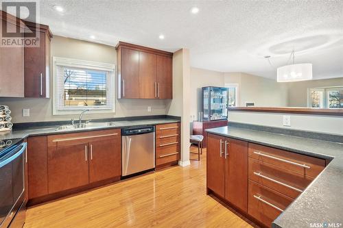 103 410 Main Street, Saskatoon, SK - Indoor Photo Showing Kitchen With Double Sink