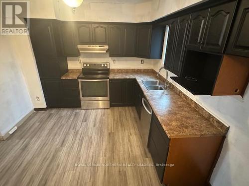 80 Elm Street S, Timmins, ON - Indoor Photo Showing Kitchen With Double Sink