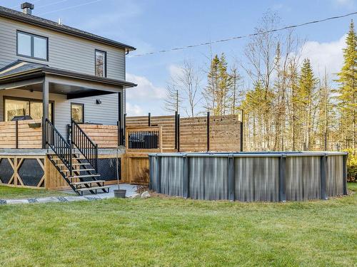 Backyard - 62 Rue De La Tourbière, Sainte-Catherine-De-La-Jacques-Cartier, QC - Outdoor With Above Ground Pool