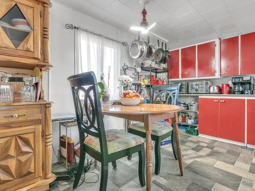 Coin-repas - 18 99E Avenue E., Blainville, QC - Indoor Photo Showing Dining Room With Fireplace