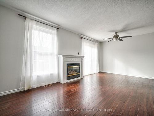 16 Christie Cres, Barrie, ON - Indoor Photo Showing Living Room With Fireplace