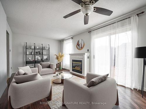 16 Christie Cres, Barrie, ON - Indoor Photo Showing Living Room With Fireplace