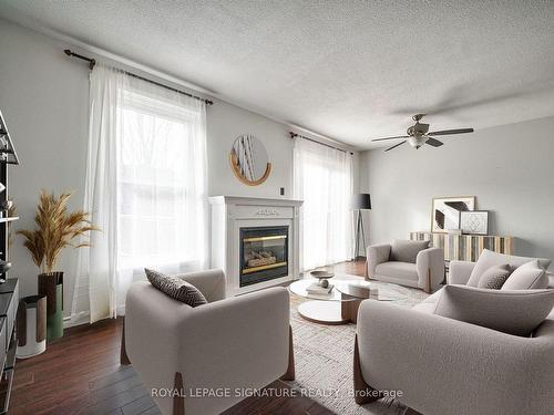 16 Christie Cres, Barrie, ON - Indoor Photo Showing Living Room With Fireplace