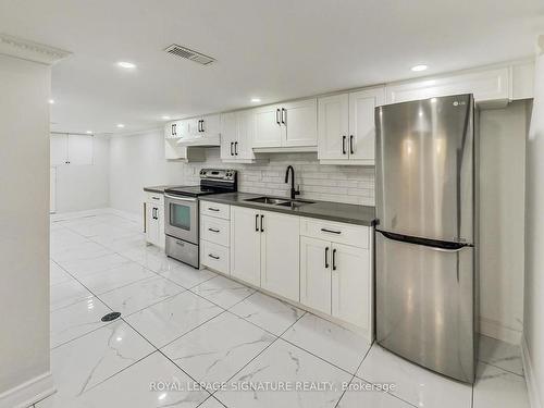 763 Tate Ave, Hamilton, ON - Indoor Photo Showing Kitchen With Double Sink