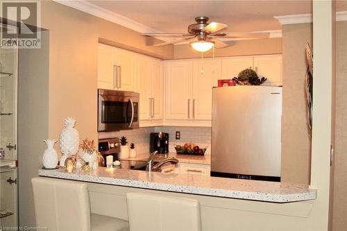 1276 Maple Crossing Boulevard Unit# 1408, Burlington, ON - Indoor Photo Showing Kitchen