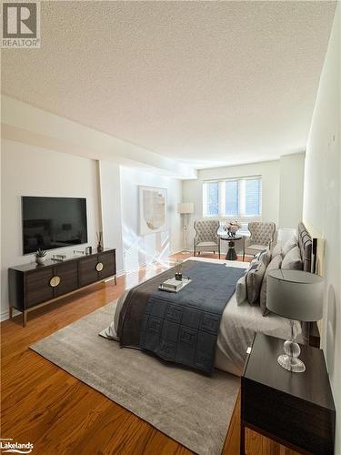 Primary Bedroom with hardwood flooring - 16 Raglan Street E Unit# 211, Collingwood, ON - Indoor