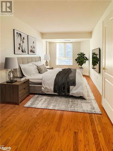 Bedroom featuring light hardwood / wood-style flooring - 16 Raglan Street E Unit# 211, Collingwood, ON - Indoor Photo Showing Bedroom