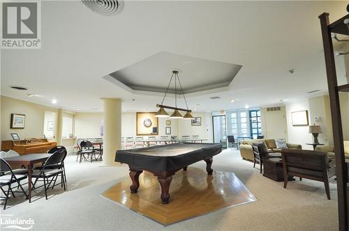 Rec room featuring light colored carpet, a raised ceiling, and billiards, ping-pong - 16 Raglan Street E Unit# 211, Collingwood, ON - Indoor Photo Showing Other Room