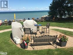 View of patio featuring a water view - 