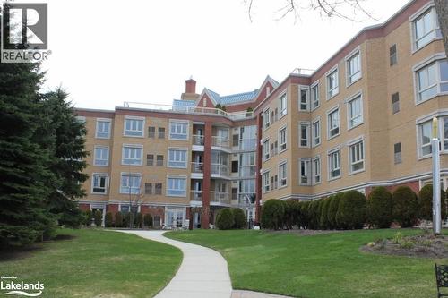 View of building exterior - 16 Raglan Street E Unit# 211, Collingwood, ON - Outdoor With Facade