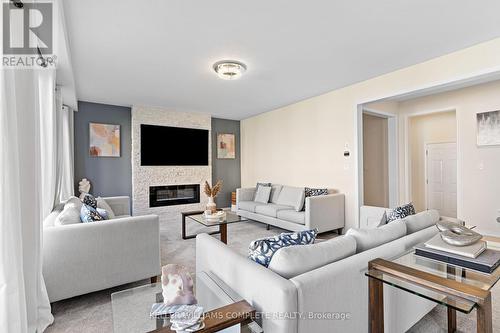 16 Doreen Drive, Thorold (562 - Hurricane/Merrittville), ON - Indoor Photo Showing Living Room With Fireplace