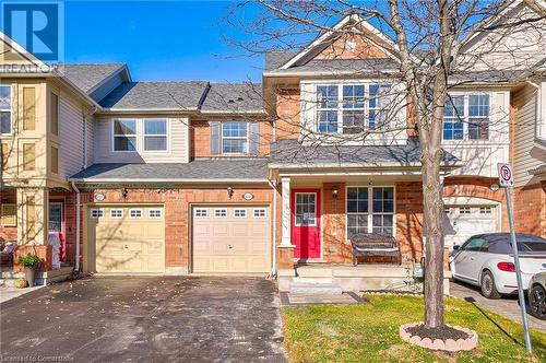 Townhome / multi-family property with a garage - 1145 Riddell Crescent, Hamilton, ON - Outdoor With Facade