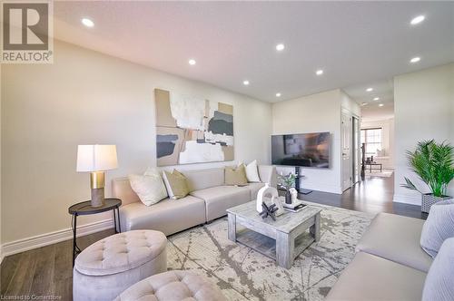 Living room featuring wood-type flooring - 1145 Riddell Crescent, Hamilton, ON - Indoor Photo Showing Living Room