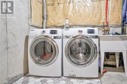 Laundry area featuring washer and clothes dryer - 