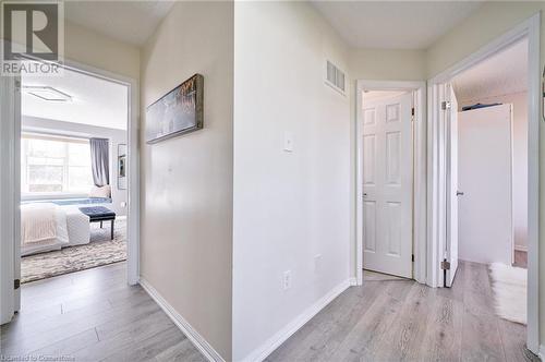 Hallway featuring light hardwood / wood-style flooring - 1145 Riddell Crescent, Hamilton, ON - Indoor