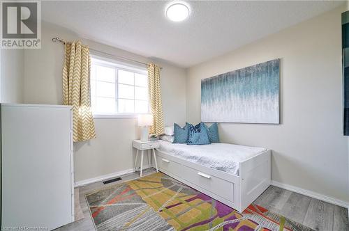 Bedroom featuring hardwood / wood-style flooring - 1145 Riddell Crescent, Hamilton, ON - Indoor Photo Showing Bedroom