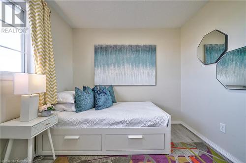 Bedroom with multiple windows - 1145 Riddell Crescent, Hamilton, ON - Indoor Photo Showing Bedroom