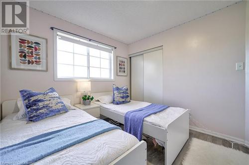 Bedroom with a closet - 1145 Riddell Crescent, Hamilton, ON - Indoor Photo Showing Bedroom