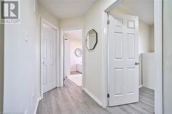 Hallway featuring light hardwood / wood-style floors - 