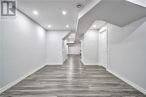 Hall featuring dark hardwood / wood-style flooring - 1145 Riddell Crescent, Hamilton, ON - Indoor Photo Showing Other Room