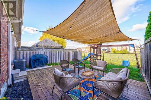 View of play area with a yard - 1145 Riddell Crescent, Hamilton, ON - Outdoor With Deck Patio Veranda With Exterior