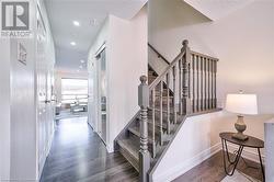 Stairway with hardwood / wood-style floors - 