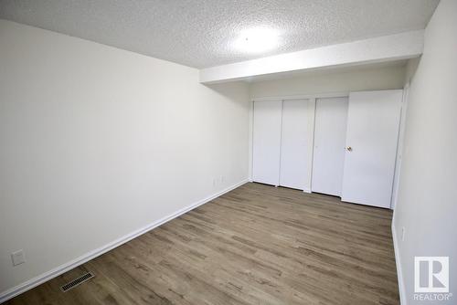 8311 29 Av Nw, Edmonton, AB - Indoor Photo Showing Other Room