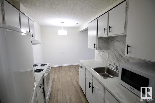 8311 29 Av Nw, Edmonton, AB - Indoor Photo Showing Other Room