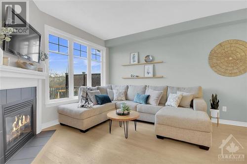 173 Mojave Crescent, Stittsville, ON - Indoor Photo Showing Living Room With Fireplace