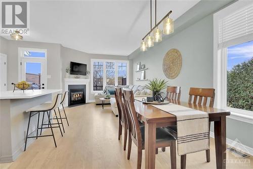 173 Mojave Crescent, Stittsville, ON - Indoor Photo Showing Dining Room With Fireplace