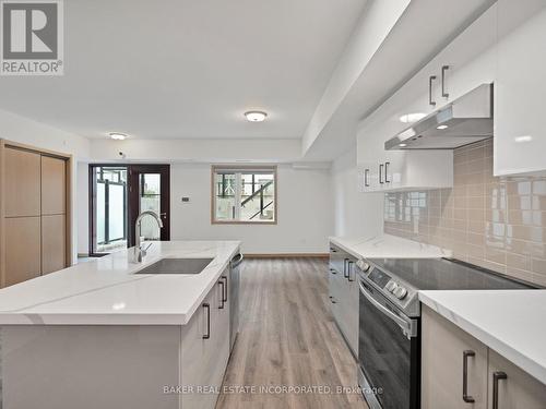 B107 - 3453 Victoria Park Avenue, Toronto, ON - Indoor Photo Showing Kitchen With Upgraded Kitchen