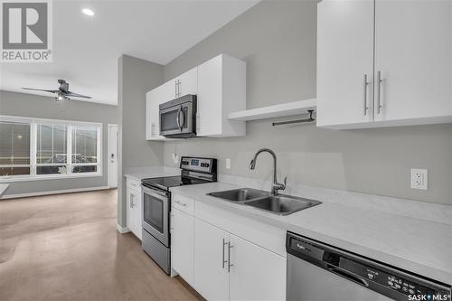 B 3905 James Hill Road, Regina, SK - Indoor Photo Showing Kitchen With Stainless Steel Kitchen With Double Sink