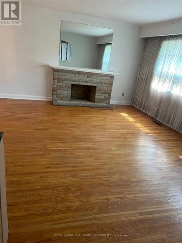 Main - 214 Dixon Road, Toronto, ON - Indoor Photo Showing Other Room With Fireplace