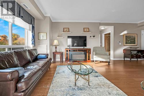 601 - 3000 Creekside Drive, Hamilton, ON - Indoor Photo Showing Living Room